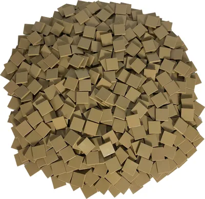 A pile of small, square, beige tiles.