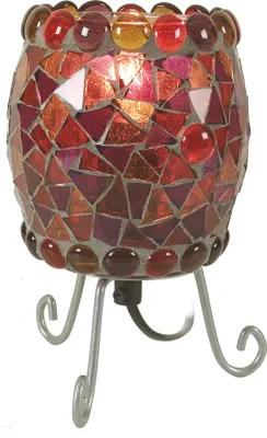 A mosaic table lamp on a stand.