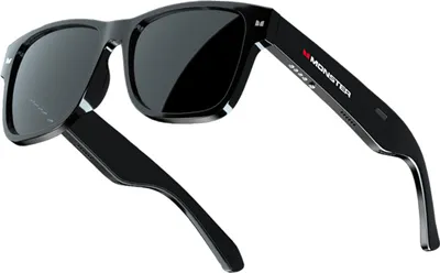 A pair of black smart sunglasses with the Monster logo on the temple.
