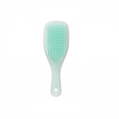 A mint green hairbrush with a white handle is shown against a white background.