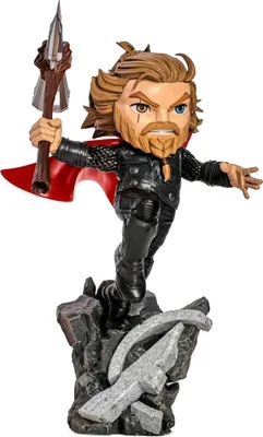 A stylized figurine of Thor standing on a rocky base.