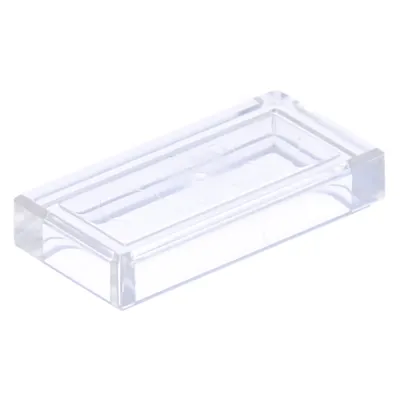 A single, clear, transparent rectangular object, likely a LEGO brick or tile, is shown against a white background.