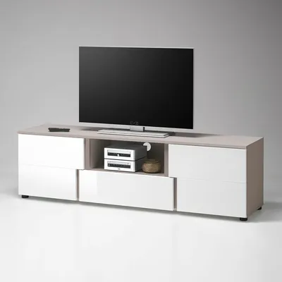 A modern TV stand with a television on top, set against a neutral background.