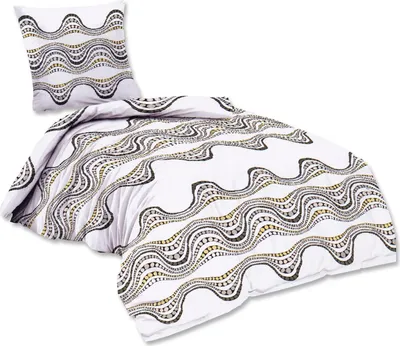 A duvet and pillow with a wavy pattern.