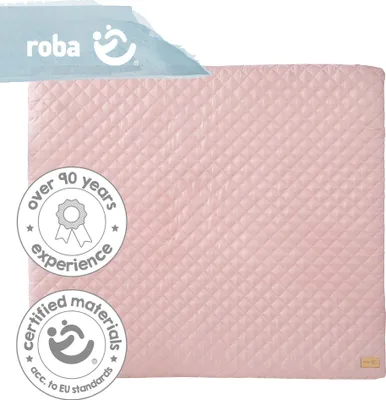 A pink quilted baby changing mat with certification badges.