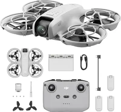 A collection of DJI drone accessories, including the drone itself, a remote controller, batteries, and charging accessories, arranged on a white background.