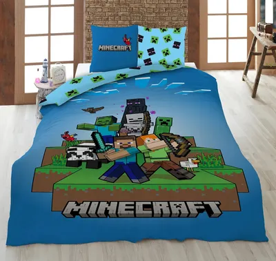 A Minecraft-themed duvet cover and pillowcase set displayed on a bed.