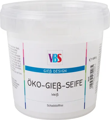 A white plastic tub of soap-making material with a label.