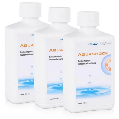 Three white bottles of 'AQUASHOCK' water treatment product.