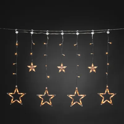 Produktbild von Konstsmide Weihnachtsdekoration,LED Solar Lichtervorhang mit Sternen, 77 bernsteinfarbene Dioden, inkl. Solarpanel, Fernbedienung, transp.Kabel, Außen