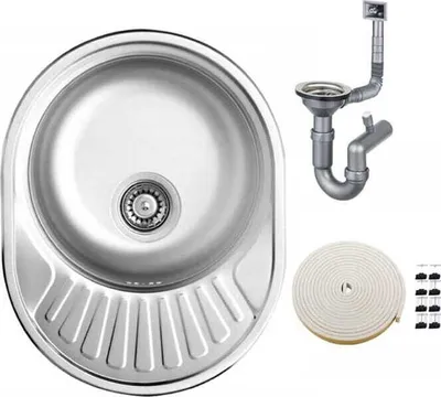 A stainless steel kitchen sink and its plumbing accessories are displayed against a white background.