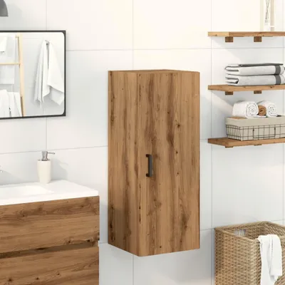 A bathroom scene with a wooden cabinet, sink, mirror, and shelves.