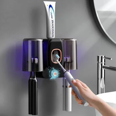 Produktbild von Automatische Tandpastadispenser in Badkamer mit zwei Bechern, schwarz, kompakt