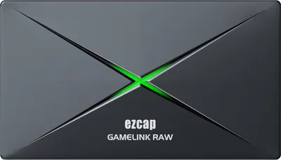 A product shot of a black video capture device with a green illuminated 'X' design.
