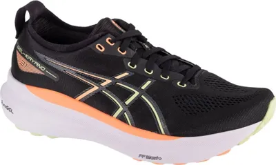 A side view of a black Asics Gel-Kayano 31 running shoe with orange and yellow accents, set against a white background.