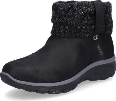 A single black boot with a knitted cuff is shown against a white background.