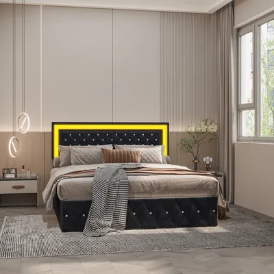 A bedroom scene featuring a bed with a tufted headboard and LED lighting.