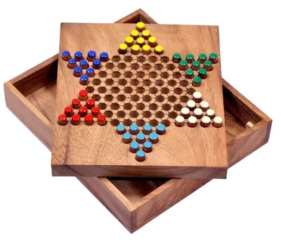 A wooden Chinese checkers board game with colorful marbles.