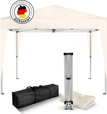A cream-colored pop-up canopy tent is shown fully assembled, with its folded frame, carrying bag, and a folded fabric piece displayed in the foreground. A circular logo with the German flag and the text 'DESIGNED IN GERMANY' is visible on the tent.