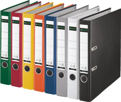 A row of colorful binders standing upright.