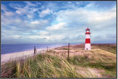 Produktbild von Wallario Wandbild Leuchtturm am Strand von Sylt, Größe: 61 x 91,50 cm, Poster mit schwarzem Aluminiumrahmen