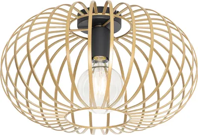 A close-up view of a gold-colored, cage-like ceiling light fixture with a black base and a clear light bulb.