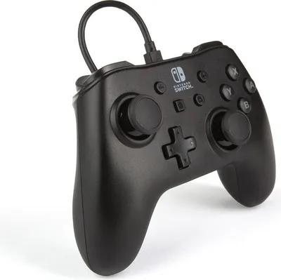 A black Nintendo Switch controller is shown from a diagonal angle against a white background.