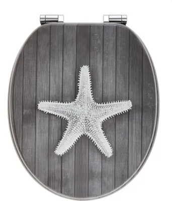 A toilet seat with a starfish design on a wooden background.