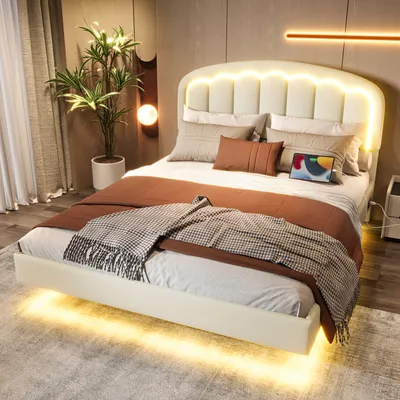 A bedroom scene with a bed, plant, and decorative lighting.