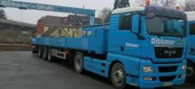 Produktbild von Herpa 914895 MAN TGX XL Europritschen-Sattelzug 2a/3a Dittmar 1:87
