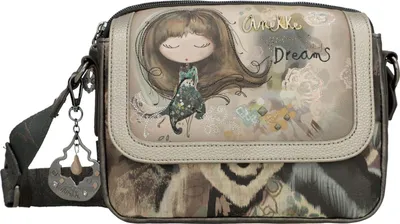 A crossbody bag with a whimsical illustration and text.