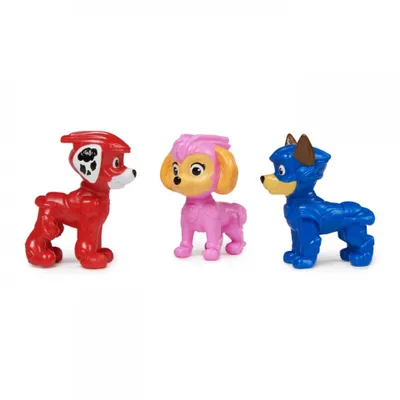 Three Paw Patrol toy figures standing on a white background.