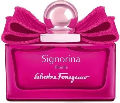 A studio shot of a pink Salvatore Ferragamo Signorina Ribelle Eau de Parfum bottle with a large pink bow on top.