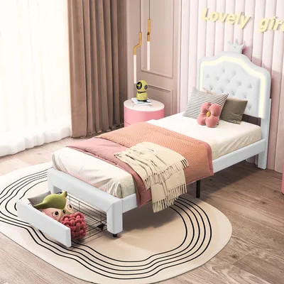 A child's bed with LED lights and a storage drawer, set in a bedroom.