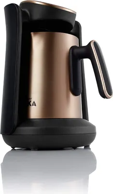 A close-up product shot of a Turkish coffee maker.