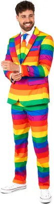 A man wearing a rainbow-striped suit.