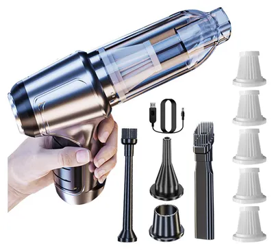 A hand holding a cordless handheld vacuum cleaner with various attachments and spare filters displayed around it.