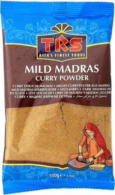 A package of mild Madras curry powder with an illustration of a woman preparing spices.
