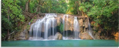 Produktbild von ARTland Glasbild Wasserfall im Wald National Park Größe: 125x50 cm