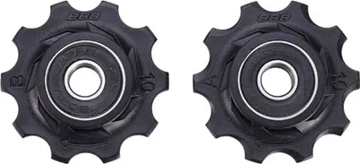 Two bicycle derailleur pulleys are shown against a white background.
