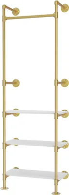 A gold pipe garment rack with three white shelves mounted on a white background.