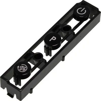 A black plastic control panel with three buttons: one with a power symbol, one with the letter 'P', and one with a symbol resembling two interlocking circles.