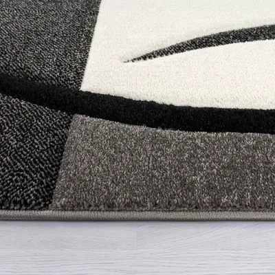 Zdjęcie produktu dla Dywan designerski z wykończeniem konturowym, wzór w kratkę, kolorystyka: czarny, biały, szary. Wymiary: 80 x 300 cm