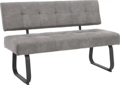 A studio shot of a gray upholstered bench with black metal legs, against a white background.