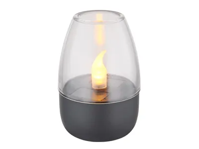 A solar-powered lantern with a flickering LED flame.