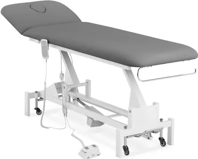 A professional studio shot of an electric massage table.