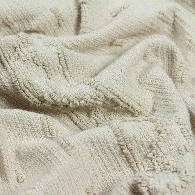 Productafbeelding van Unyqoos® Boho-Ruit – 100% katoen, geometrisch getuft patroon en franjes, zachte woondeken voor bank en bed, meerkleurig