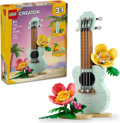 The image shows the packaging of a LEGO Creator Tropical Ukulele set, with a built ukulele and flowers displayed on the box. A separate image of the built ukulele with flowers is also present.