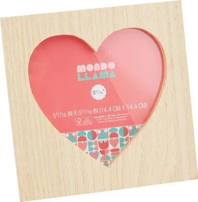 A wooden picture frame with a heart-shaped opening.