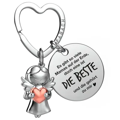 A silver-colored keychain with an angel charm holding a pink heart and a circular engraved charm.